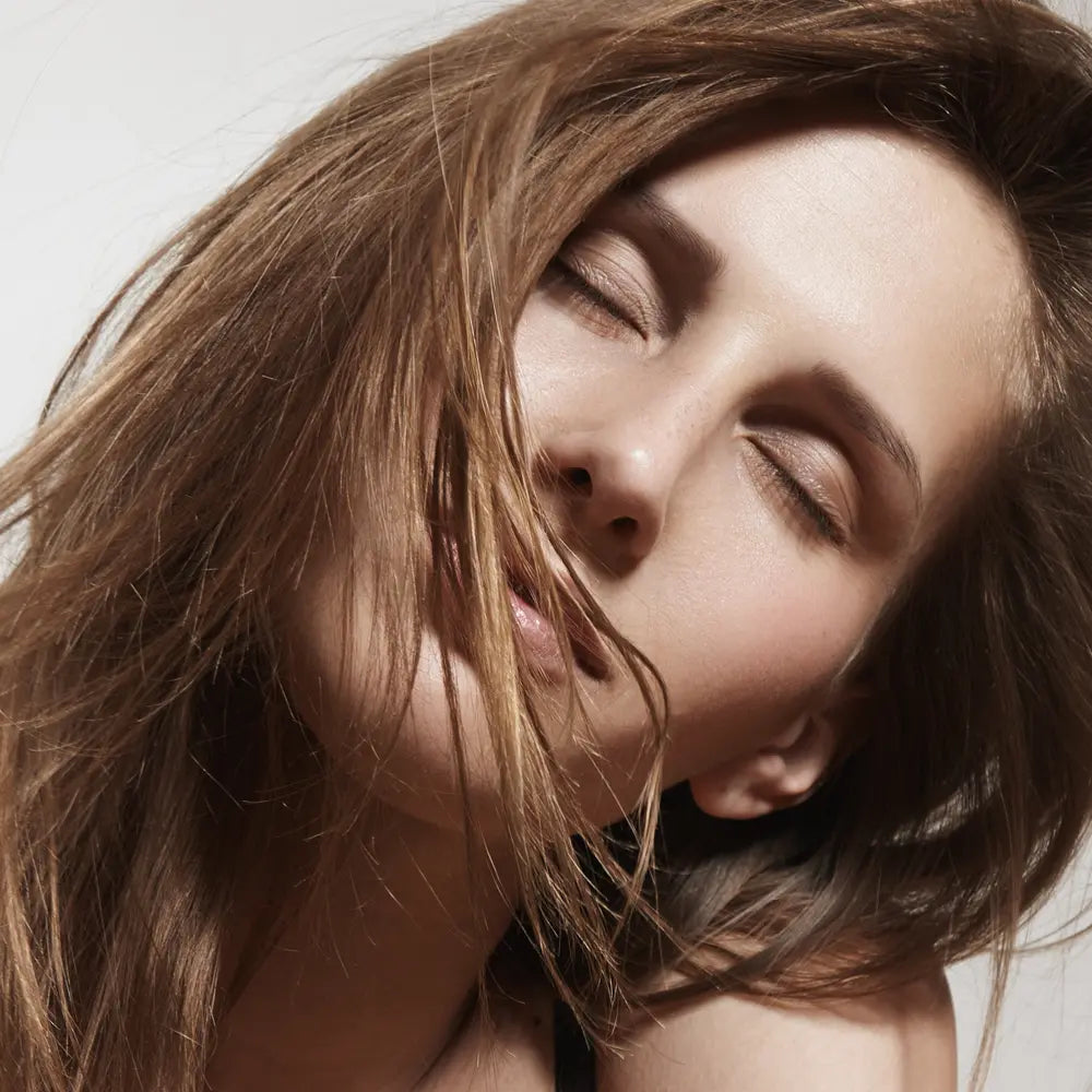 beautiful woman with her eyes closed